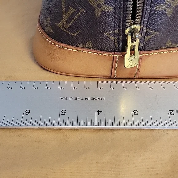 LOUIS VUITTON Alma monogram - Picture 12 of 16